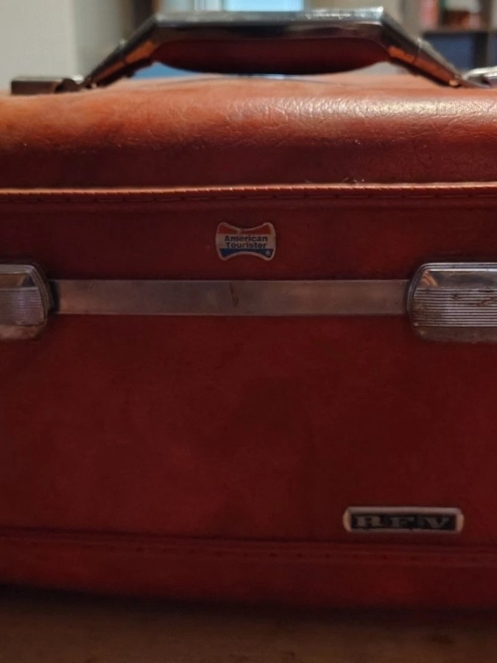 vintage red marbled hardshell American Tourister cosmetic travel train case